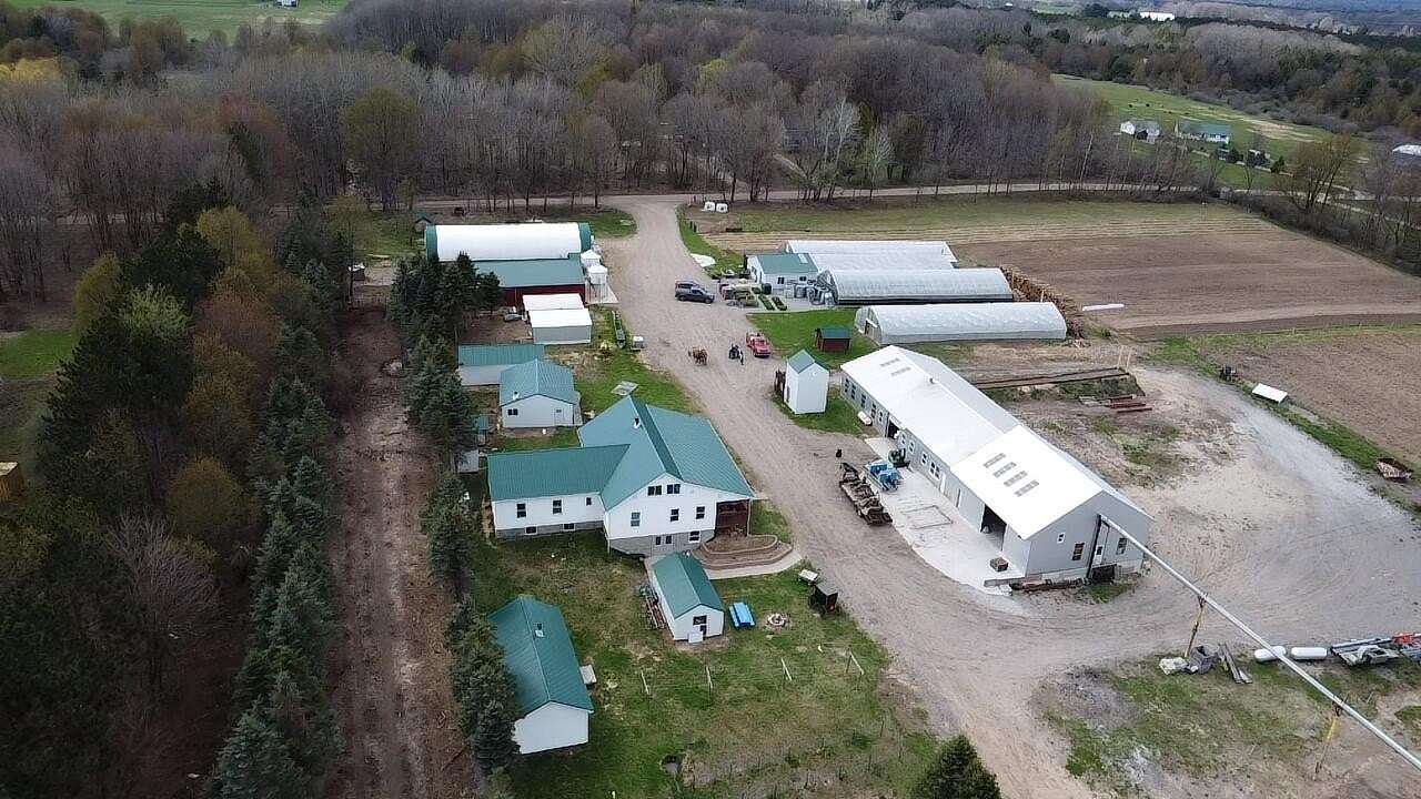 30 Acres of Agricultural Land with Home for Sale in Brethren, Michigan