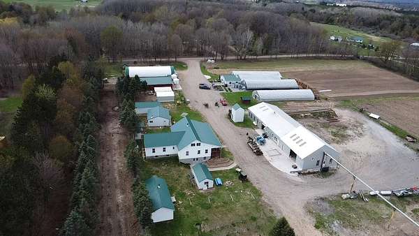 30 Acres of Agricultural Land with Home for Sale in Brethren, Michigan