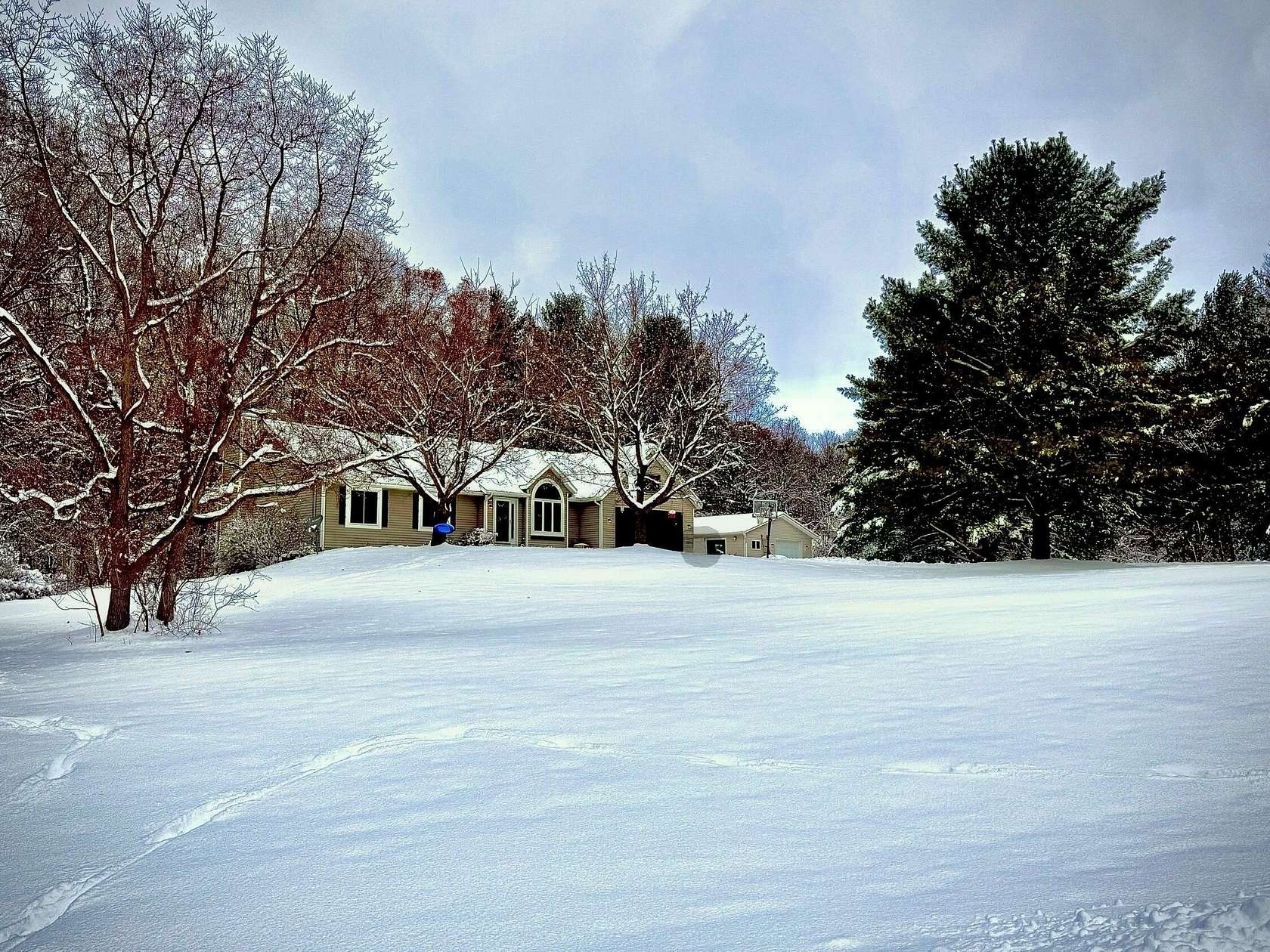 2.87 Acres of Residential Land with Home for Sale in Rockford, Michigan
