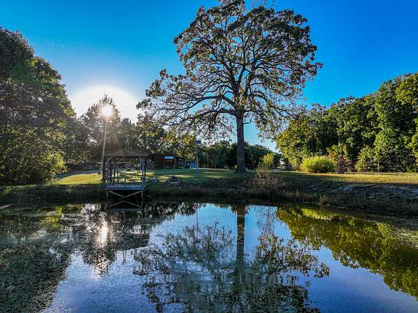 10.5 Acres of Recreational Land with Home for Sale in Osceola, Missouri