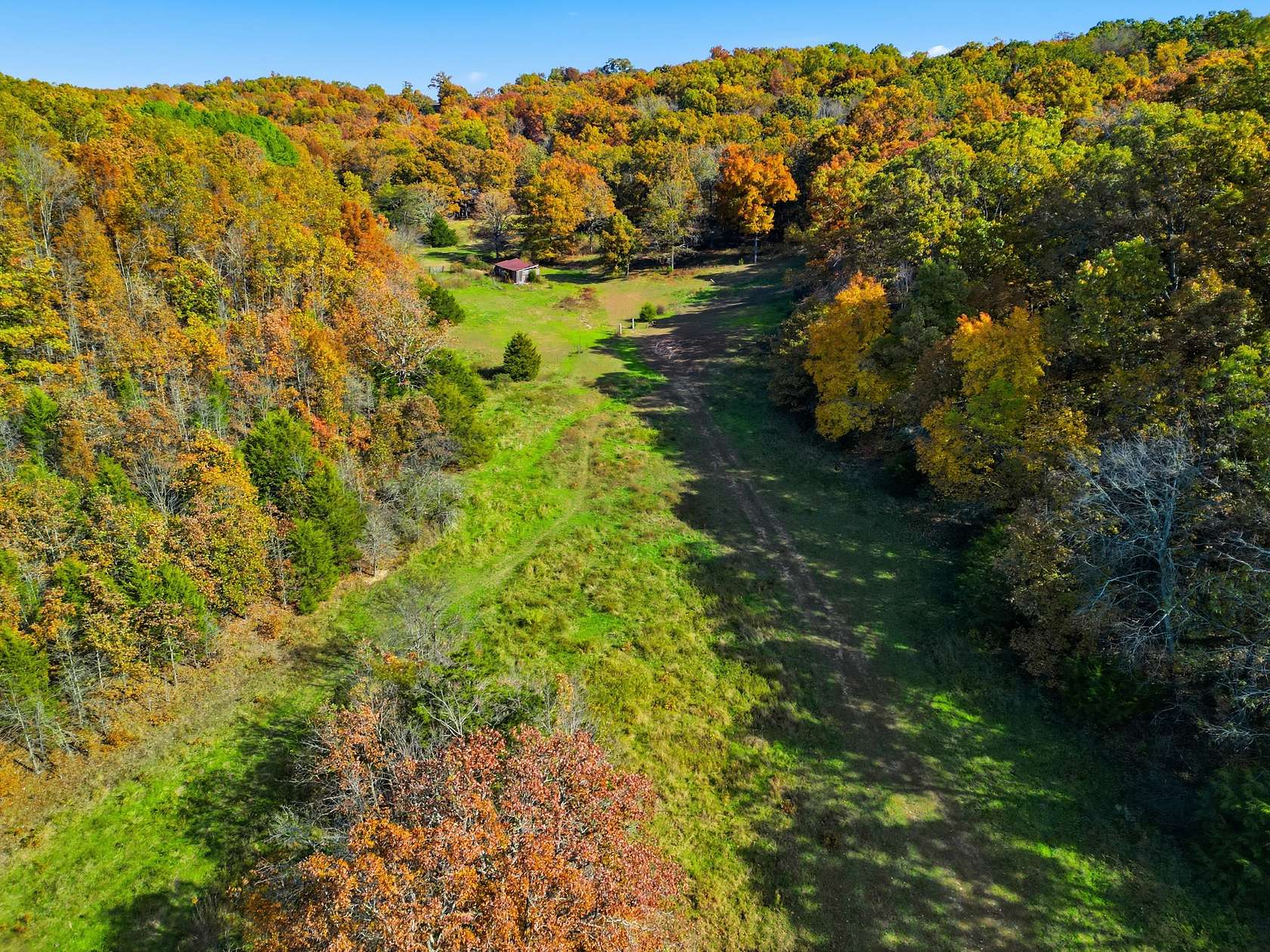 196 Acres of Land with Home for Sale in Dora, Missouri