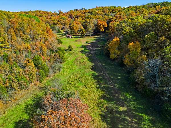 196 Acres of Land with Home for Sale in Dora, Missouri