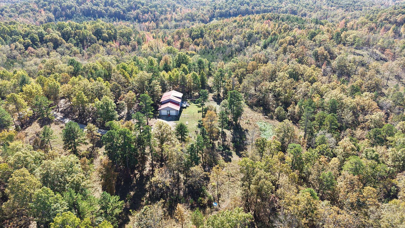 10 Acres of Recreational Land with Home for Sale in Melbourne, Arkansas