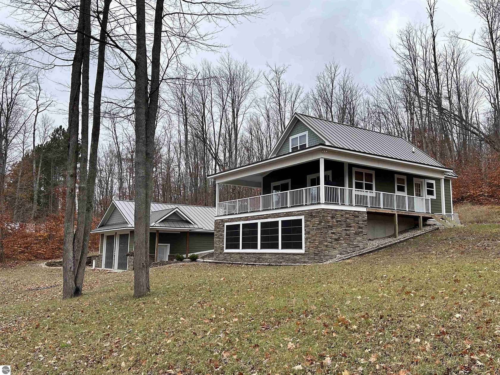 9.7 Acres of Residential Land with Home for Sale in Kalkaska, Michigan