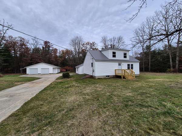 10 Acres of Residential Land with Home for Sale in White Cloud, Michigan