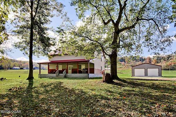 4 Acres of Land with Home for Sale in Pineville, Missouri