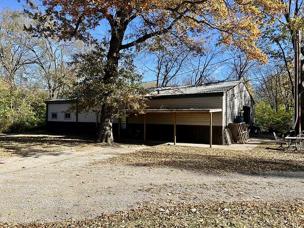 6.69 Acres of Residential Land with Home for Sale in St. Joseph, Illinois