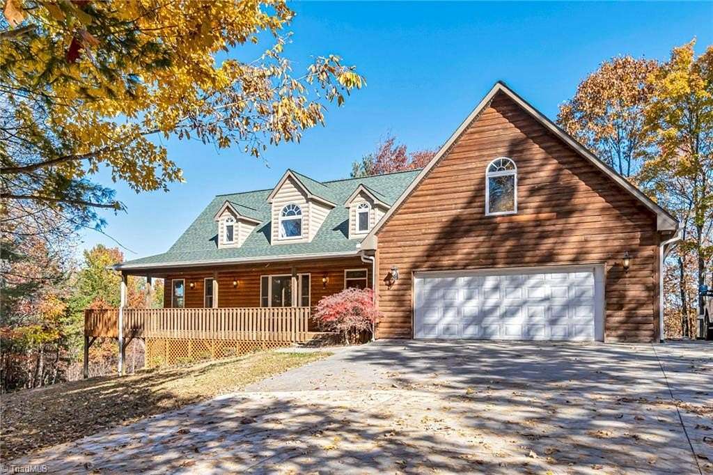 6.35 Acres of Land with Home for Sale in Boomer, North Carolina