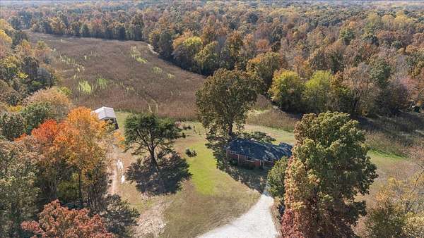56.5 Acres of Land with Home for Sale in Big Sandy, Tennessee