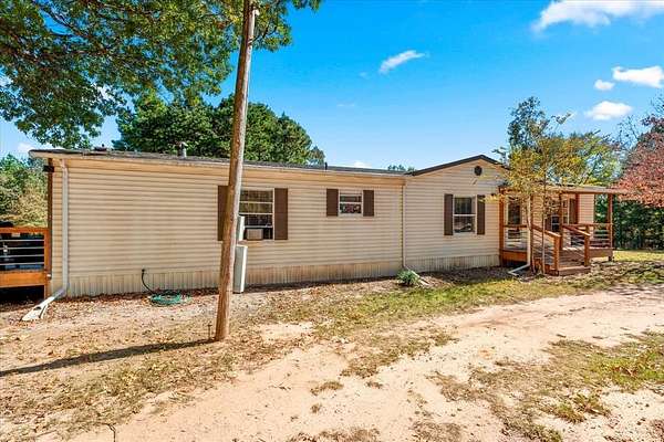 6.75 Acres of Residential Land with Home for Sale in Leesburg, Texas