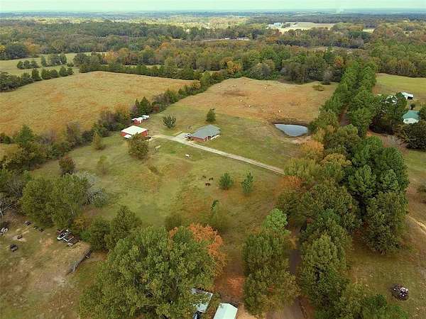 4.33 Acres of Residential Land with Home for Sale in Cookville, Texas