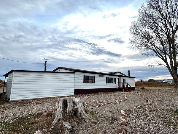 2.5 Acres of Residential Land with Home for Sale in Naples, Utah