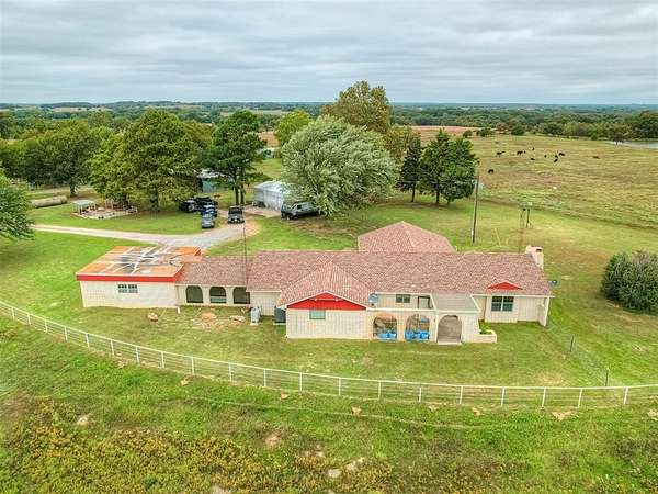 80 Acres of Agricultural Land with Home for Sale in Okemah, Oklahoma