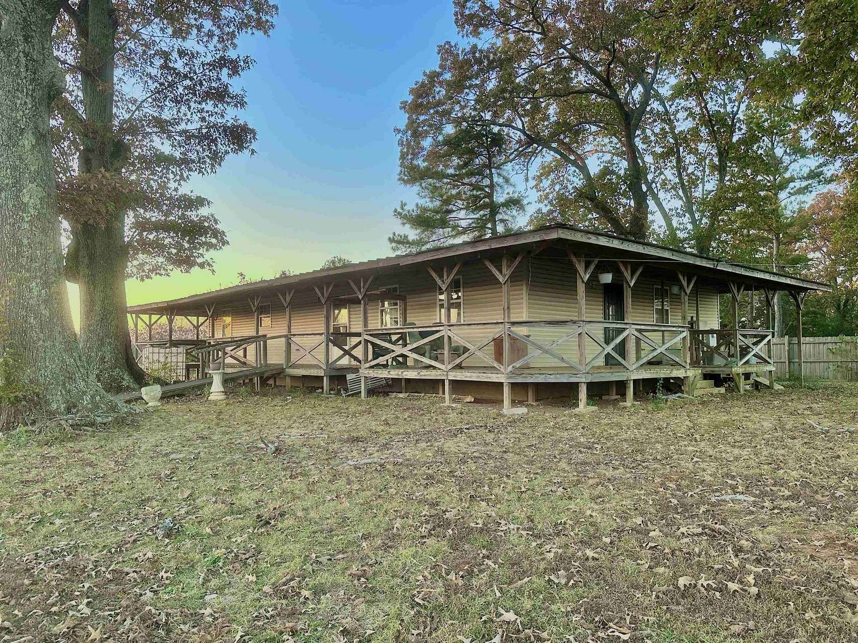 6.6 Acres of Residential Land with Home for Sale in Florence, Alabama