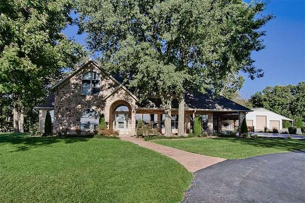 6.77 Acres of Land with Home for Sale in Farmington, Arkansas