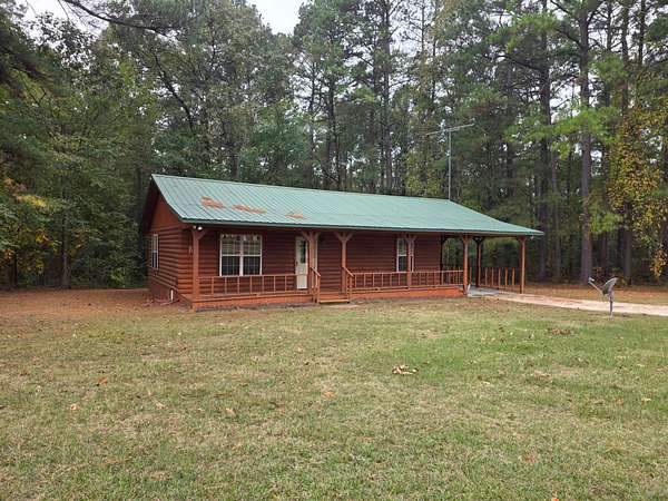 27.9 Acres of Land with Home for Sale in Simms, Texas