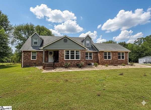 9.39 Acres of Land with Home for Sale in Fountain Inn, South Carolina