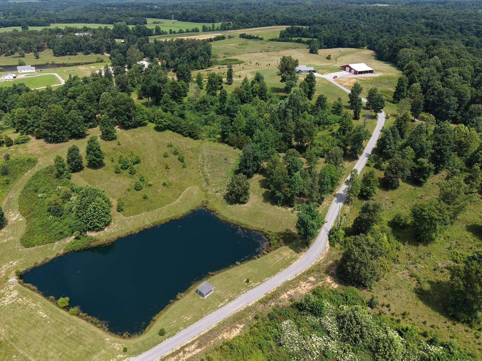 60 Acres of Land with Home for Sale in Morgantown, Kentucky