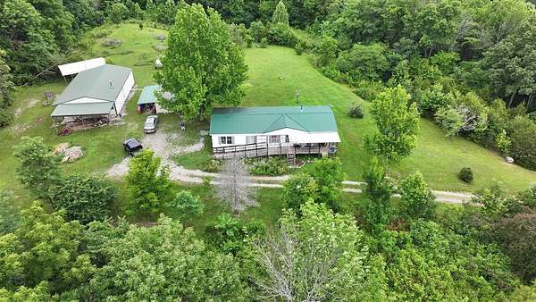 57 Acres of Land with Home for Sale in Willow Shade, Kentucky