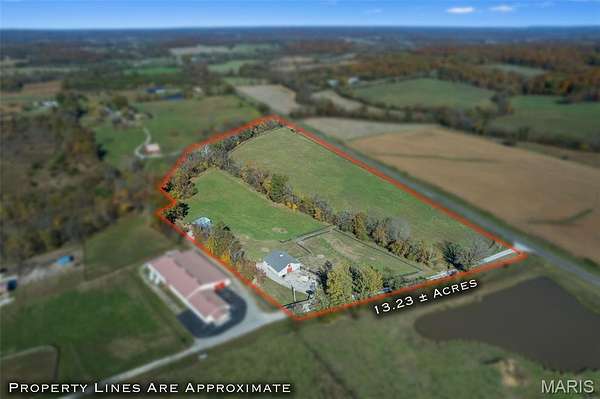 13.2 Acres of Agricultural Land for Sale in Oak Ridge, Missouri