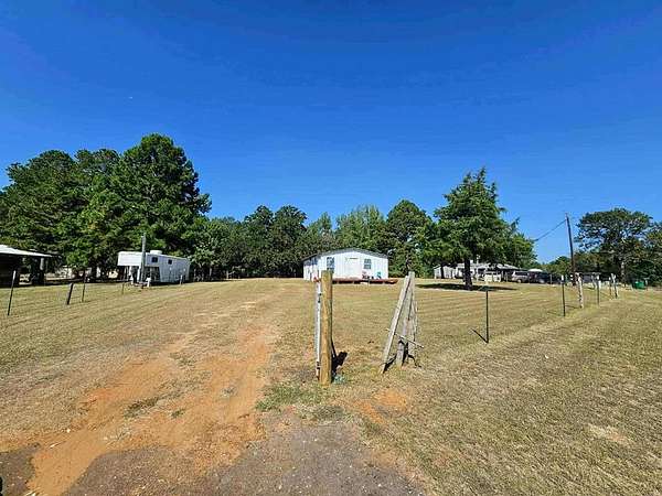 2.35 Acres of Land with Home for Sale in Elkhart, Texas