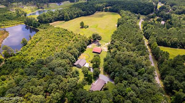 20.1 Acres of Agricultural Land with Home for Sale in Carthage, North Carolina