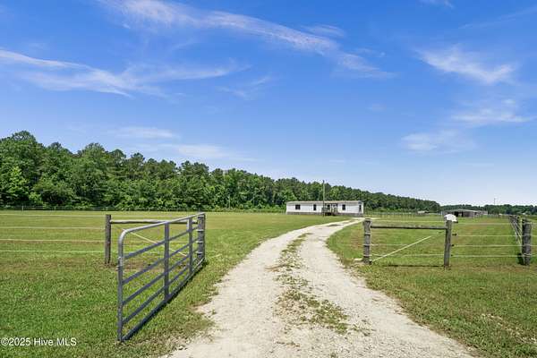 15.6 Acres of Land with Home for Sale in Burgaw, North Carolina