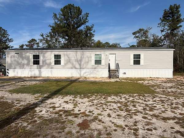 4.7 Acres of Residential Land with Home for Sale in Lakeland, Georgia