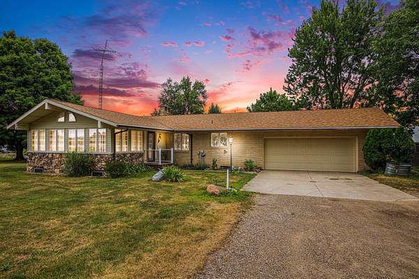 2.77 Acres of Residential Land with Home for Sale in Eau Claire, Michigan