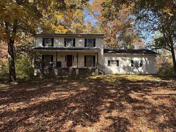 1.58 Acres of Land with Home for Sale in Lawrenceville, Georgia