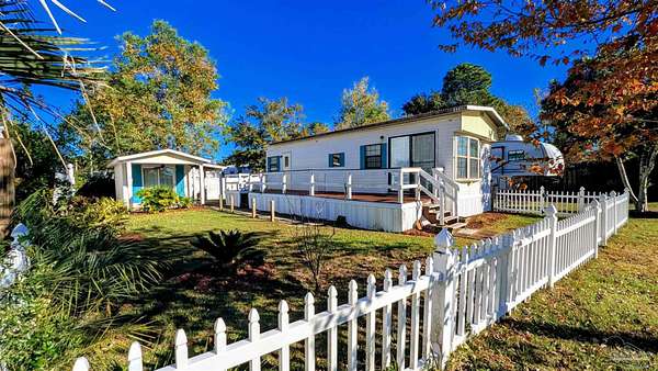 0.73 Acres of Residential Land with Home for Sale in Lillian, Alabama