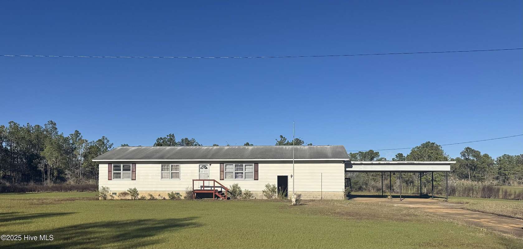 10 Acres of Recreational Land with Home for Sale in Lowland, North Carolina