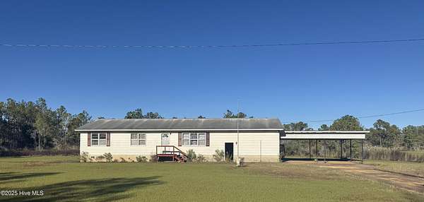 10 Acres of Recreational Land with Home for Sale in Lowland, North Carolina