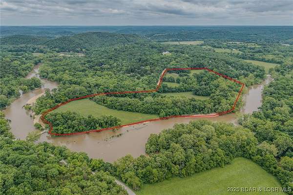 35.2 Acres of Land with Home for Sale in Macks Creek, Missouri