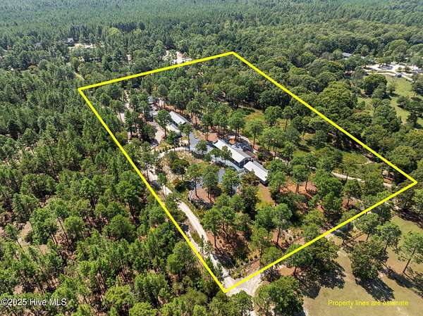 8 Acres of Land with Home for Sale in Aberdeen, North Carolina
