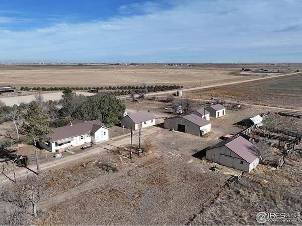 4.3 Acres of Residential Land with Home for Sale in Keenesburg, Colorado