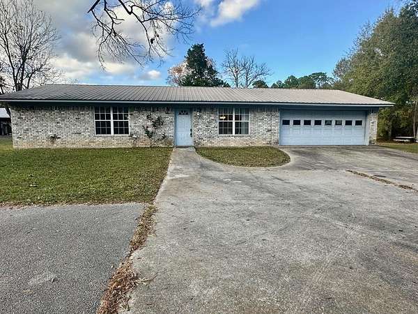 4.79 Acres of Land with Home for Sale in Center, Texas