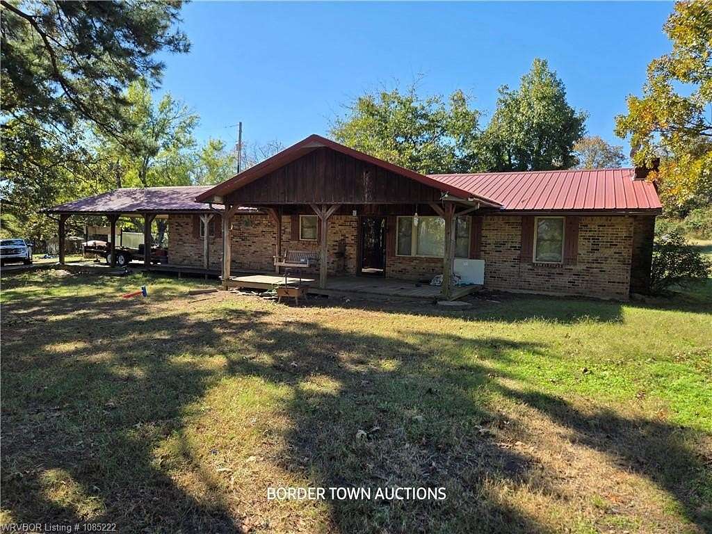 2 Acres of Residential Land with Home for Auction in Muldrow, Oklahoma
