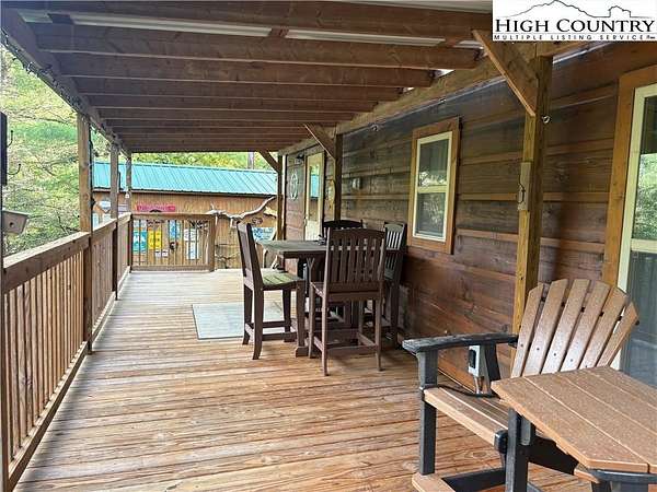 1 Acre of Residential Land with Home for Sale in Grassy Creek, North Carolina