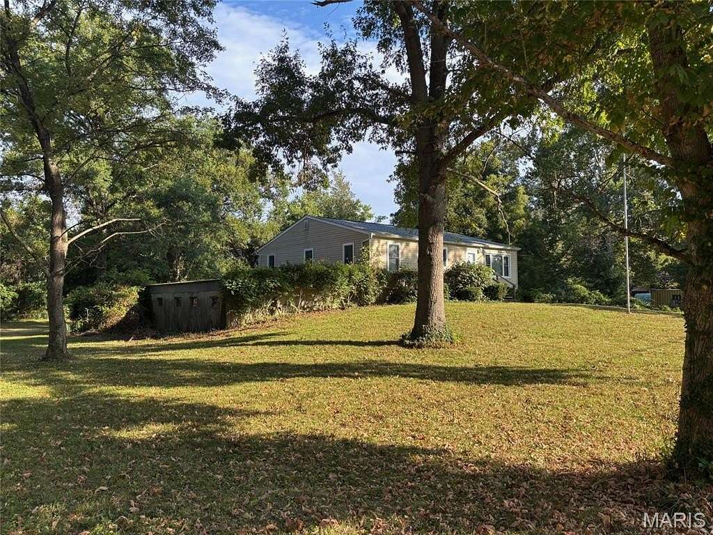 0.75 Acres of Residential Land with Home for Sale in House Springs, Missouri