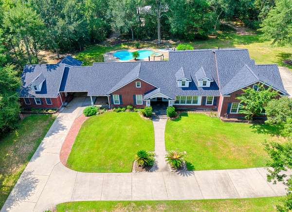 6 Acres of Residential Land with Home for Lease in Montgomery, Texas