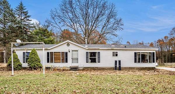 2.4 Acres of Residential Land with Home for Sale in Newaygo, Michigan