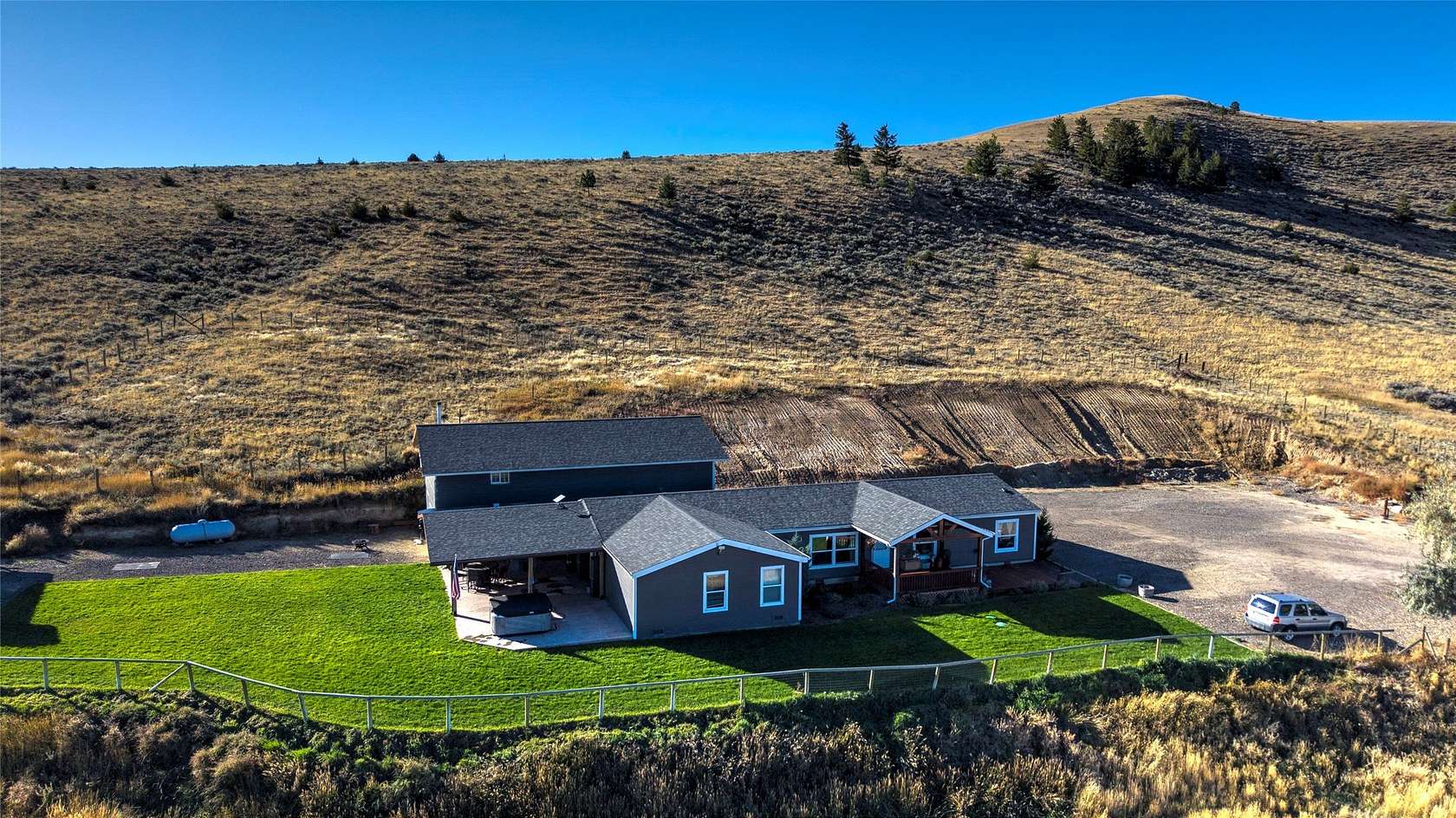 5 Acres of Residential Land with Home for Sale in Corvallis, Montana