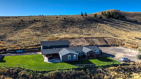 5 Acres of Residential Land with Home for Sale in Corvallis, Montana