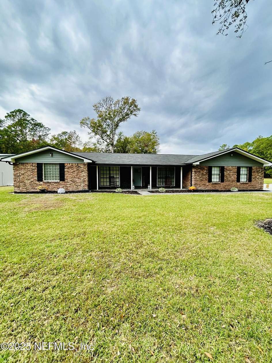 5 Acres of Residential Land with Home for Sale in Bryceville, Florida