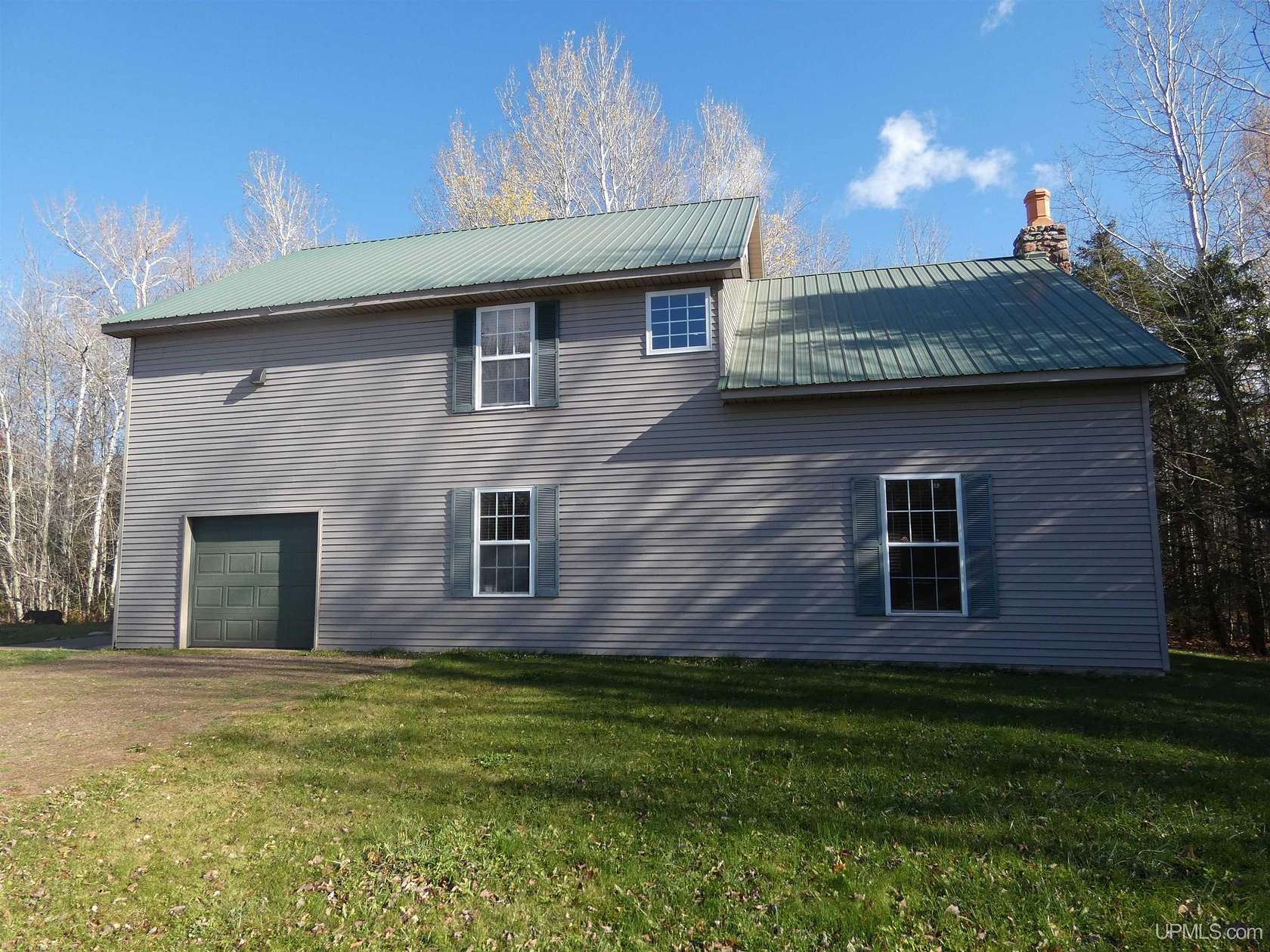 7 Acres of Residential Land with Home for Sale in White Pine, Michigan