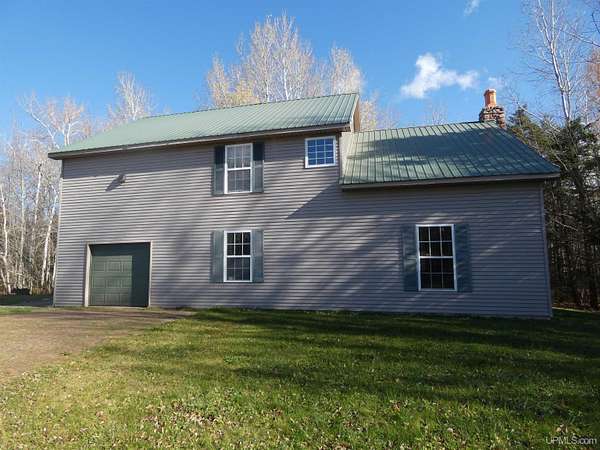 7 Acres of Residential Land with Home for Sale in White Pine, Michigan