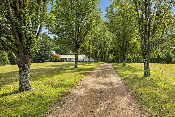 10.7 Acres of Land with Home for Sale in Fairview, Tennessee