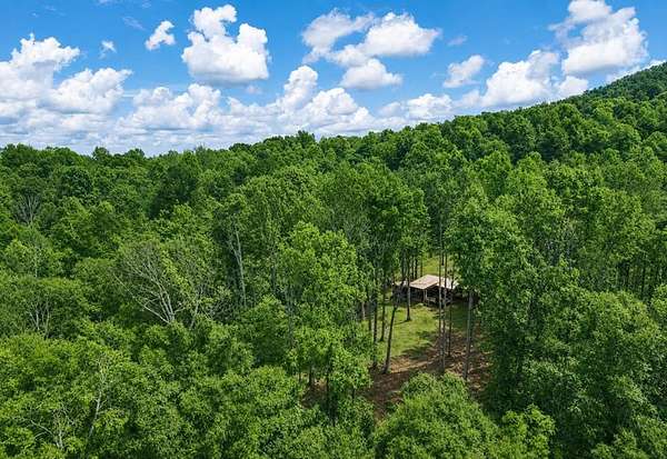 6.6 Acres of Land with Home for Sale in Hilham, Tennessee