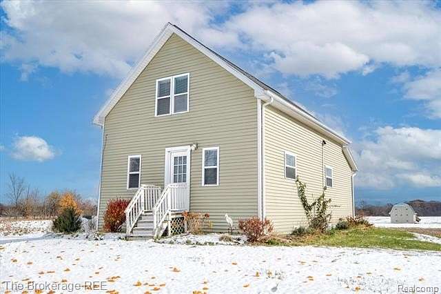 2 Acres of Residential Land with Home for Sale in New Lothrop, Michigan